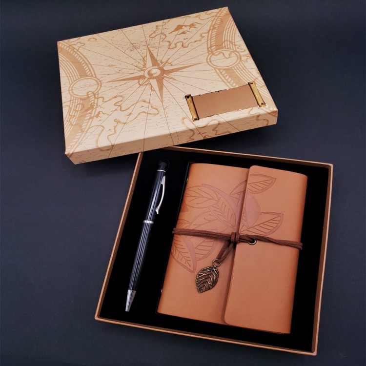 Tan Notebook and Black Pen
