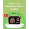 Geçmişin zarafetini modern teknolojinin konforuyla buluşturan bu retro radyo, hem dekoratif bir obje hem de güçlü bir müzik cihazıdır.Klasik çizgilere sahip estetik tasarımı, vintage tarz sevenler için mükemmel bir atmosfer yaratır.Bluetooth bağlantı dest