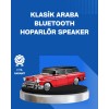 Retro tasarımın modern ses teknolojisiyle birleştiği bu hoparlör, gerçekçi detaylarıyla dikkat çeker. Hareketli tekerlekleri, yüksek parlak boya ve LED ışıklarıyla dekoratif bir obje görünümündedir. Bluetooth özelliği sayesinde akıllı telefon, tablet ve b